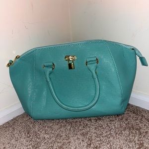 Teal pocketbook with shoulder strap